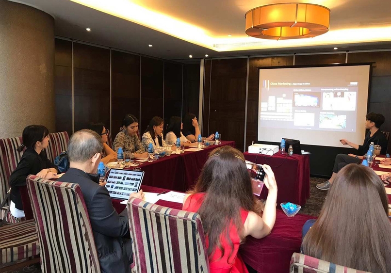 Photo: Caze Chui (person presenting) hosting a “marketing in China” seminar for clients. (Photos courtesy of ChinaMarketing.Asia) 
