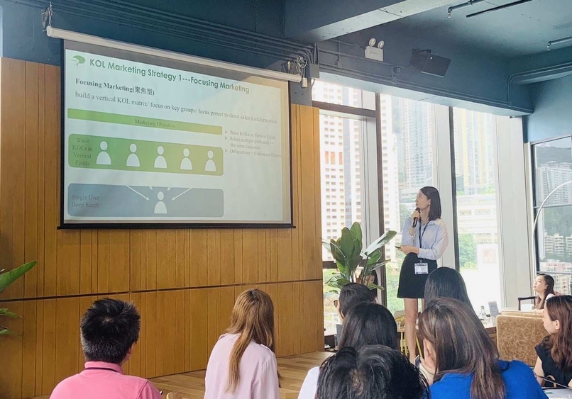 Photo: Nicole Xin (person standing) hosting a “marketing in China” seminar for clients. (Photos courtesy of ChinaMarketing.Asia) 